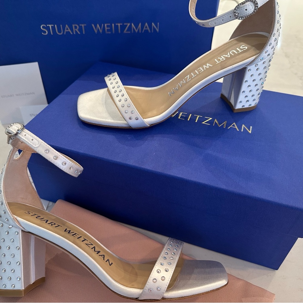 Stuart Weirzman IvorySatin Rhinestone 2.5” heel. Brand new. Never worn. Size 5.5